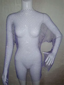 Detailed view of women's stylish purple long-sleeved fishnet mesh dress with sparkles