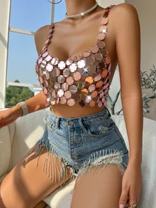 Close-up of rose gold acrylic sequin halter top with metallic luster