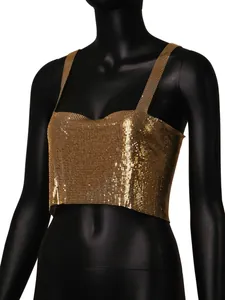 Detail showing the intricate gold metallic mesh texture of the sequin crop top