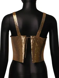 Macro view of gold metallic sequin crop top showing back clasp on black mannequin