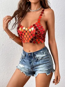 Detailed macro view of a red metallic acrylic disk halter crop top on a fashion model