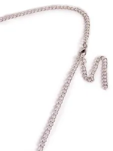 Detail of adjustable silver chain strap with lobster clasp for nightclub top.