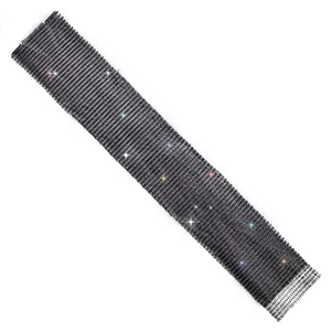 Close-up detail of black mesh fabric with sparkling multi-colored rhinestones texture