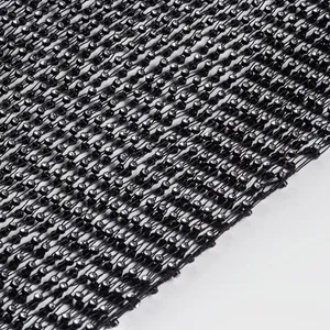 Macro view of high-quality black mesh fabric featuring sparkling rhinestone detailing