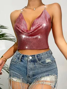 Detailed view of sexy pink metallic sequin halter top featuring a deep V-neck and backless design