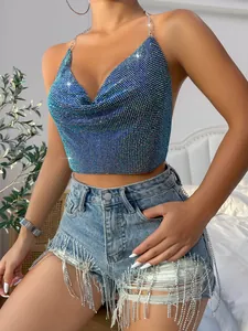 Detailed close-up view of sparkly blue rhinestone halter top with silver chain straps