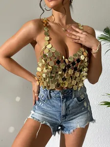 Close-up detail of a sexy gold metallic sequin halter top worn by a model in summer