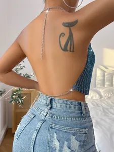 Detailed view of the sparkling blue rhinestone texture on this backless sexy halter top