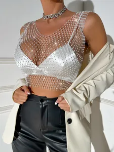 Detail shot of a sexy white mesh tank top decorated with sparkling rhinestones for clubwear