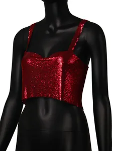 Close-up detail of a vibrant red sequin metallic mesh crop top on a black mannequin