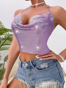 Macro view of a sexy purple metallic sequin halter top featuring thin chain straps