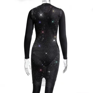 Detailed view of elegant black mesh dress with sparkling rhinestones for party wear