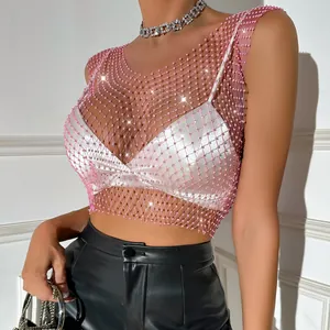 Detailed macro view of pink fishnet top with shimmering rhinestones and elegant mesh design