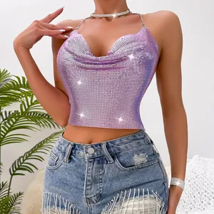 Detailed macro view of a purple metallic sequin halter top with sexy backless design.