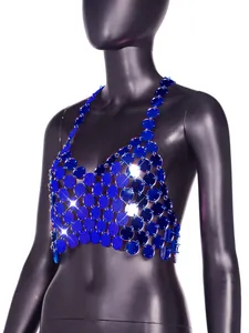 Close-up detail of the electric blue acrylic disc halter top shown on a black mannequin