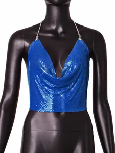 Close-up detail of electric blue metallic sequin halter crop top on a black mannequin.
