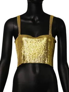 Detailed texture shot of a shimmering gold metallic mesh crop top on a mannequin