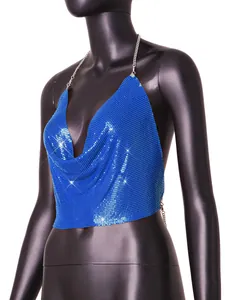 Close-up detail of electric blue metal sequin halter top with shiny mesh texture