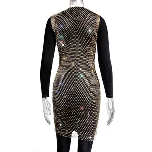 Back view detail of elegant black long sleeve dress with gold rhinestone mesh overlay
