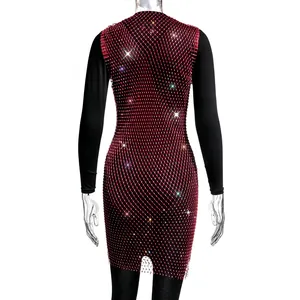 Close-up back view of elegant red mesh fishnet dress with sparkling rhinestones
