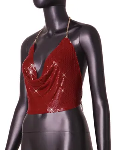 Detailed view of sexy red metal sequin chainmail halter top with a draped V-neckline