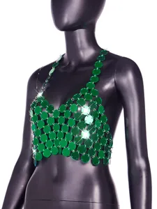 Close-up detail of a sexy green acrylic sequin halter top with shiny metal rings