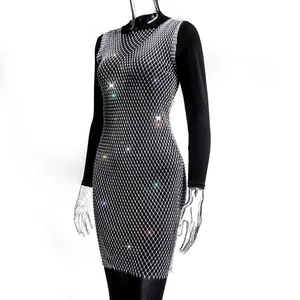 Elegant rhinestone mesh dress detail showing sparkling diamond pattern on fishnet fabric