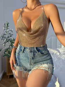 Detailed view of sexy gold rhinestone mesh halter top with deep V-neck and backless design.