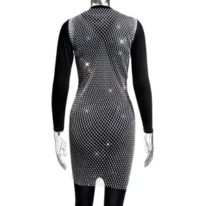Detailed back view of elegant silver rhinestone mesh overlay dress on black long sleeve base