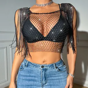 Close-up of black rhinestone mesh crop top with sparkling fringe shoulder details
