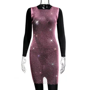 Detailed macro view of pink rhinestone fishnet dress with sparkling crystal mesh