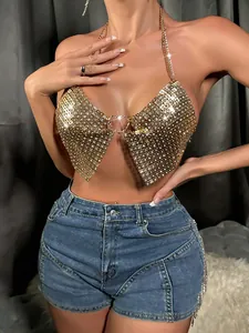 Sexy gold sequin halter top with rhinestone heart detail and denim shorts ensemble