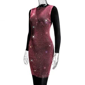 Close-up detail of a pink rhinestone mesh party dress with sparkling embellishments