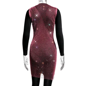 Detailed back view of a sparkling pink mesh party dress decorated with rhinestones