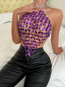 Close-up of a sexy purple acrylic gem halter top featuring a backless metal chain design