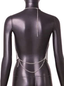 Back view detail of silver rhinestone metal mesh halter top featuring elegant chain design