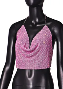 Close-up detail of a pink rhinestone mesh halter top featuring draped neckline and chain straps