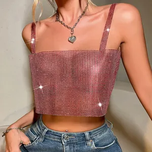 Close-up macro view of sparkly sexy pink rhinestone fishnet crop top for women party wear