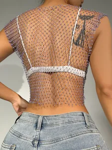 Back detail of purple rhinestone mesh fishnet crop top with sparkling crystals