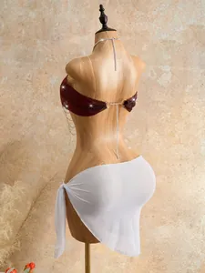 Exquisite detail back view of burgundy rhinestone mesh bra body chain on a mannequin