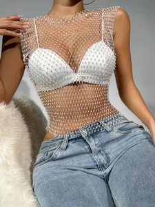 Exquisite close-up of a sexy rhinestone fishnet mesh tank top for night clubs and festivals.