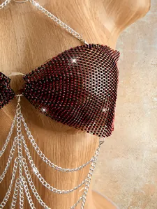 Close-up of red rhinestone mesh body chain with multi-layer silver tassel chains