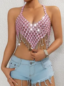 Detailed view of a sexy pink gemstone halter top featuring elegant metal tassel chains