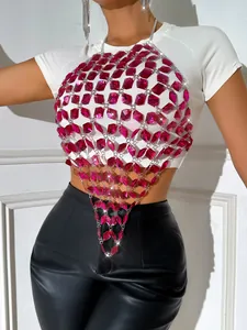 Pink acrylic gemstone body chain vest accessory over a white crop top