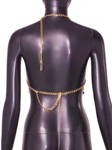 Detailed back view of a sexy gold metal body chain top featuring star pendants and link chains
