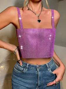 Close-up detail of sexy pink rhinestone mesh camisole top with shimmering crystals