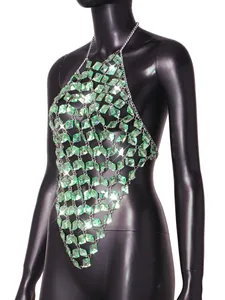 Close-up of sexy green acrylic gem chain vest with sparkling diamond-cut details