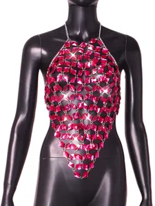 Close-up of pink faceted acrylic gems on a metallic halter body chain vest