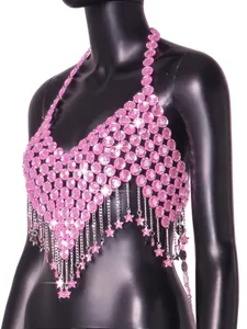 Detailed view of pink acrylic crystal body chain with star pendants on mannequin