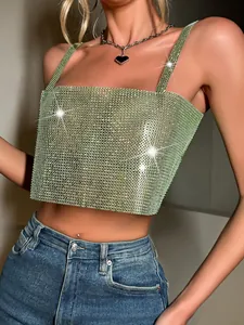 Close-up view of sexy green fishnet rhinestone camisole with sparkling mesh details